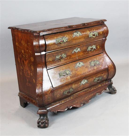 A 19th century Dutch walnut and marquetry double bombé commode, W.3ft 7in. D.1ft 10in. H.2ft 10in.